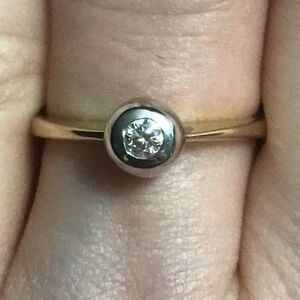 Elegant Gold Ring with Diamond Accent